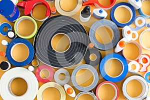 Striking abstract pattern of glue pots and tape