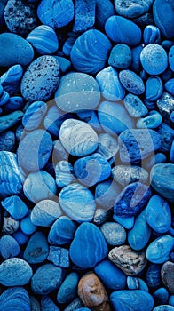 A striking assemblage of rugged, irregularly shaped blue minerals and stones, their varied hues and textures creating a