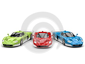 Striking concept super cars in red, green and blue base colors with white details - top view