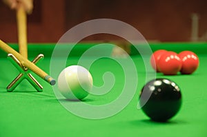 Striking the cue ball with a short rest