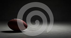 Dramatic football render on dark concrete floor