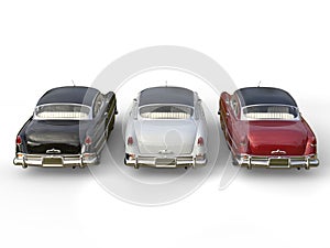 Striking vintage cars - black, white and cherry red