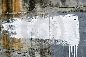 A striking white paint streak on a gritty concrete wall, with dripping details, perfect for urban-themed graphics, text photo