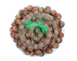 String bag with hazelnuts