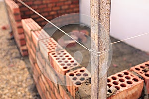 String being used as a level in brick laying