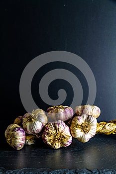 String of garlic, copyspace at top, reflection