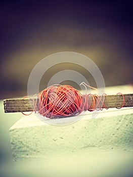 String net on stick, spirit level