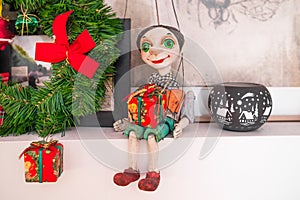 String operated handmade ceramic puppet, christmas deco
