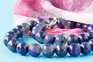 A string of round lapis lazuli beads