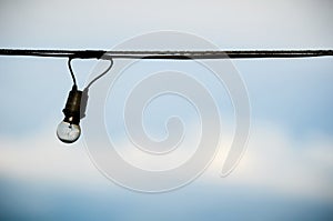 String wired of bulb on blue sky background