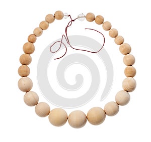 String of wooden beads isolated on white