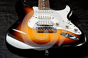 Stringed electric musical instrument. Musical instrument for rock, blues, metal songs. Guitar strings, close up