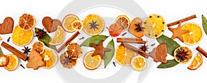 Strip of dried oranges, lemons, mandarins, star anise, cinnamon sticks and gingerbread, isolated on white