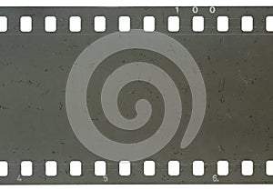 Strip of old celluloid film with dust and scratches photo