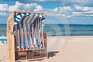 Stripe blue colourfed beach roofed chairs in Travemunde, Germany