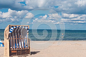 Stripe blue colourfed beach roofed chairs in Travemunde, Germany