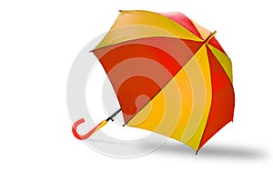 Stripe umbrellas Red and Yellow color with handle, isolated with clipping path selection on white background. Object or Rainy photo