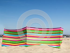 Stripe windbreak at the beach photo