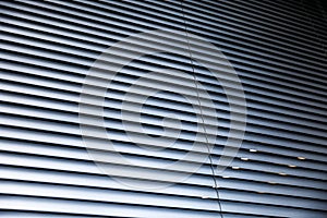 Striped background with silver blinds