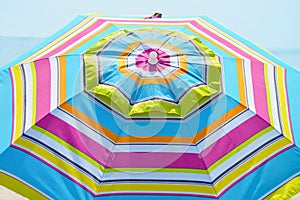 Striped beach umbrella.