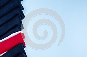 Striped cotton scarf composition on blue background