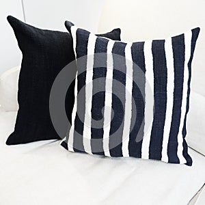 Striped cushion on a sofa