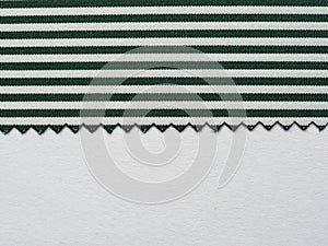 Striped dark green and white cotton fabric texture background