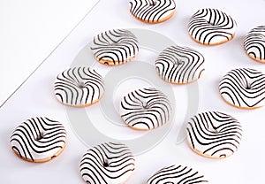 Striped donuts on a white background.