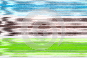 Striped fabric pattern in soft pastel colors. Abstract textured background.