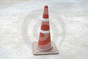 Striped orange cones on the asphalt road