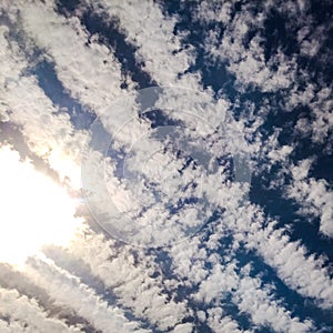 Striped Pattern Clouds Against Blue Sky