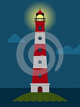 Striped red and white lighthouse at night