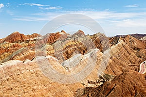 Striped rock formations in Danxia Feng, or Colored Rainbow Mountains, in Zhangye, Gansu photo