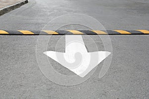 Striped speed bump on street. Road safety