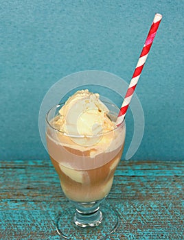Striped straw in root beer float
