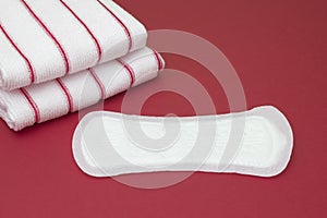 Striped terry towels and daily menstrual woman pad for blood period. Menstruation sanitary soft pads, hygiene protection. Woman cr