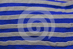 Striped texture of knitted fabric as a background