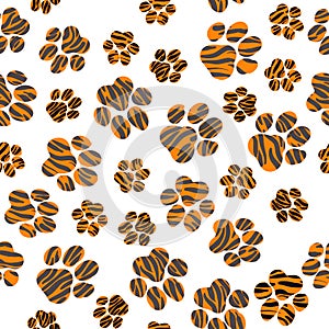 Striped tiger paw prints. Seamless pattern