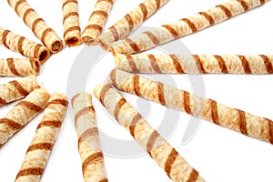 Striped wafer tubules with a chocolate cream, isolated 2 photo