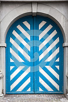 Striped white and blue old door