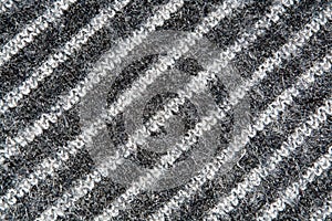 Striped white and gray weave wool yarn closeup