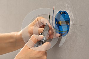 Striping the insulation of wires with cutter