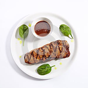 Striploin steak with sauce top view