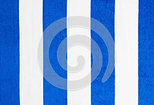 Stripped summer beach towel background. photo