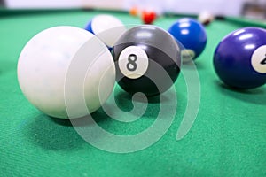 Pooltable and balls close up