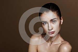 Strobing or Highlighting makeup. Closeup portrait of beautiful g
