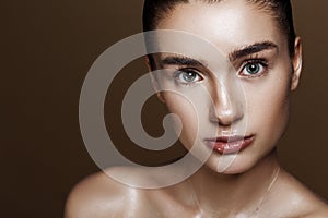 Strobing or Highlighting makeup. Closeup portrait of beautiful g