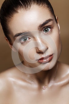 Strobing or Highlighting makeup. Closeup portrait of beautiful g