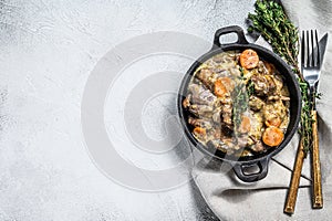 Stroganoff chicken liver with mushrooms and cream. White background. Top view. Copy space