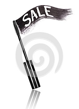 Stroke of black mascara with inscription Sale and brush